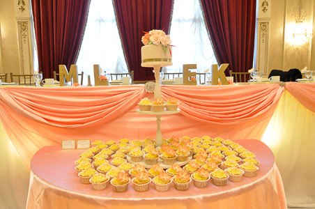Wedding cake with cupcakes