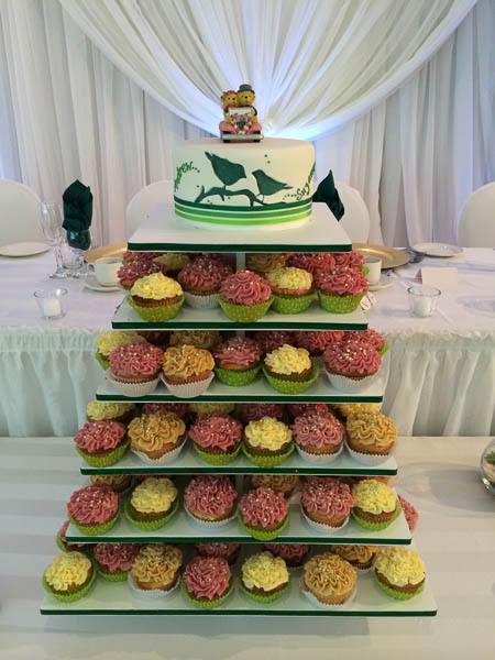 Wedding cake with cupcakes
