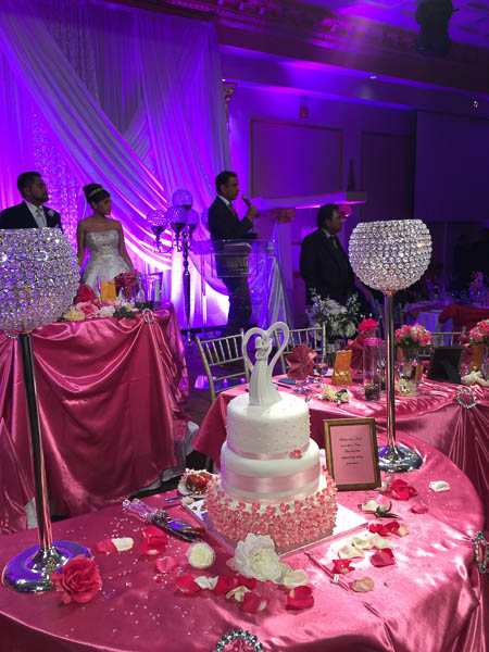 A view of the head table and stage where a podium is setup.